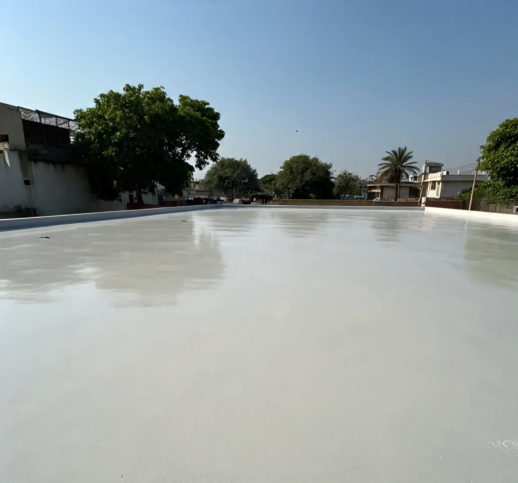 Flat roof waterproofing in Hyderabad using high-quality protective coatings to prevent leaks.